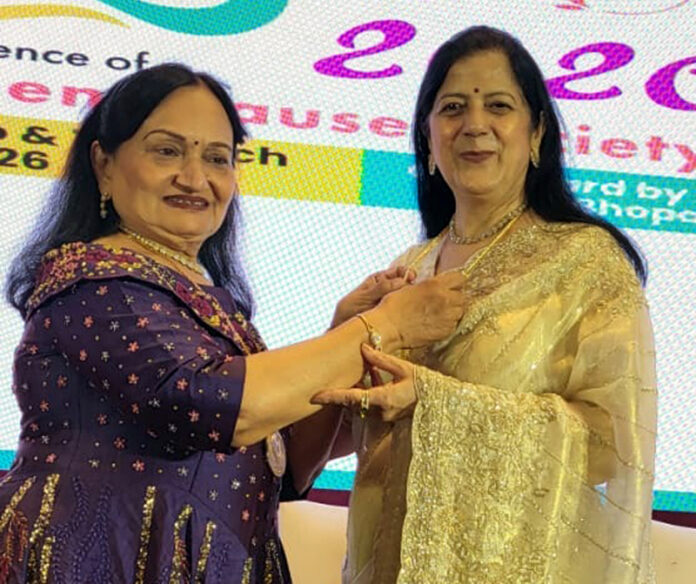 Outgoing president Dr Anita Shah handing over the baton to Dr Sudhaa Sharma in Bhopal.