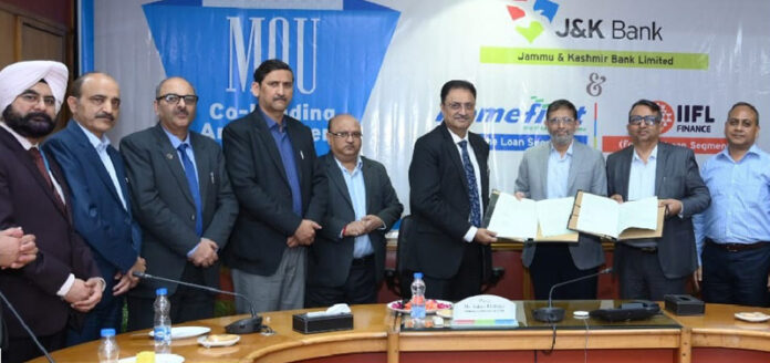 Dignitaries from J&K Bank and NBFCs signing MoUs in Jammu on Saturday.