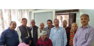 Doctor examining a patient during heart-check up camp by Jammu Central Mahajan Sabha.