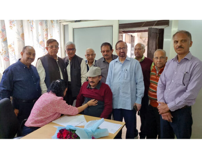 Doctor examining a patient during heart-check up camp by Jammu Central Mahajan Sabha. Doctor examining a patient during heart-check up camp by Jammu Central Mahajan Sabha.