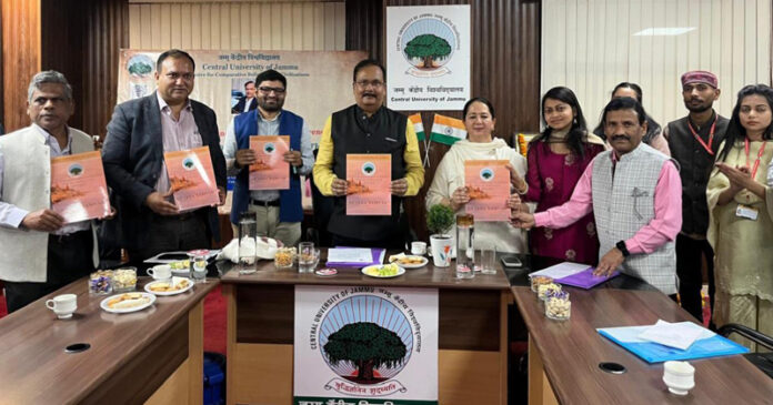 CUJ VC releasing annual newsletter of the Centre for Comparative Religions and Civilizations, during conference.