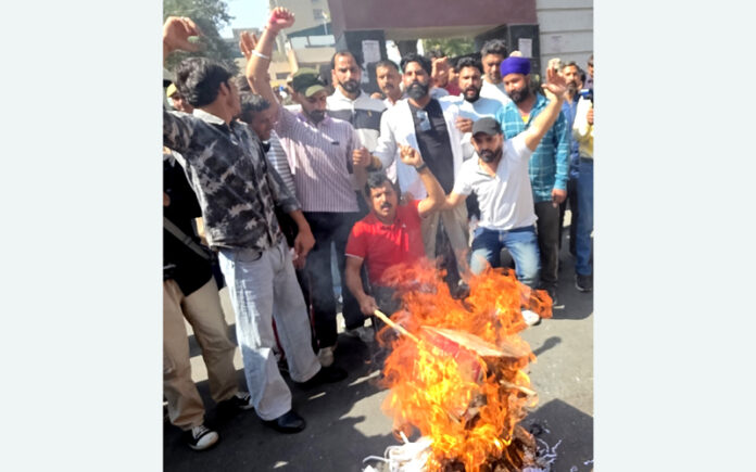 Activists of Rashtriya Bajrang Dal during a protest outside GMC Jammu on Thursday. — Excelsior/Rakesh