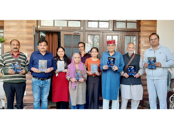 Prof Shiv Nirmohi and others releasing Sonika Sharma's book at Udhampur on Sunday.