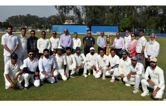 Winning team posing along with dignitaries during prize distribution ceremony.