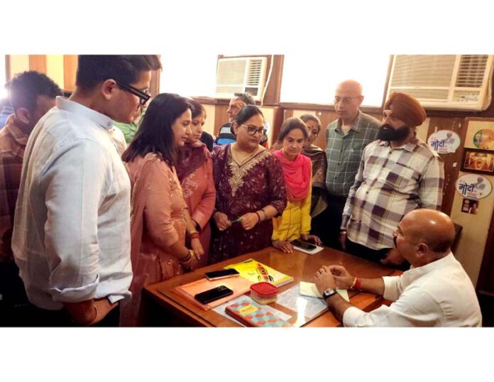 MLA Jammu East, Yudhvir Sethi listening the people’s grievances at a Public Darbar at Jammu on Thursday.