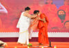 Acharya Bal Krishan puts shawl over Swami Ramdev during a function to celebrate 32nd Sanyas Diwas of Swami Ramdev in Haridwar.