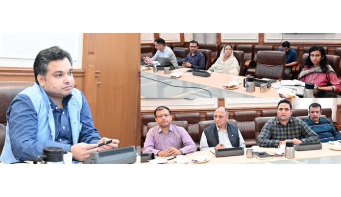 Secretary IT chairing a meeting at Jammu on Friday.