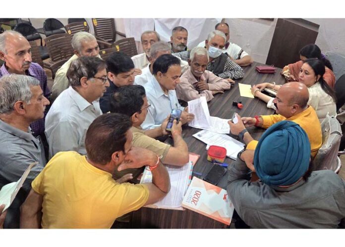 MLA Jammu East, Yudhvir Sethi listening public grievances at Jammu on Thursday.