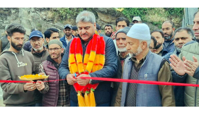 MLA Sajjad Shaheen inaugurating work on a steel footbridge at Shafa Pani in Banihal on Tuesday.