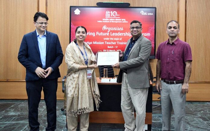 A participant of the Future Leadership Program being awarded certificate during valedictory function at IIM Jammu.