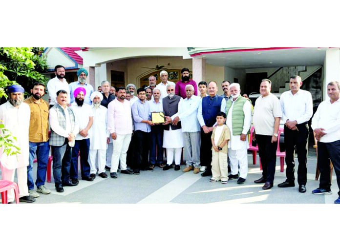 All India Jat Mahasabha felicitating JKAS achiever Rohit Choudhary in RS Pura.