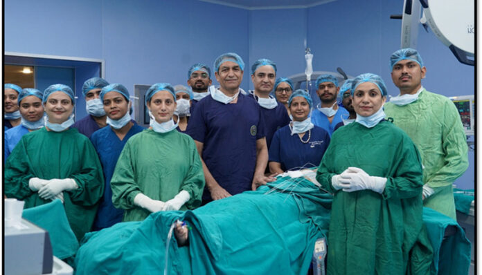 A team of doctors posing for a group photograph after performing bilateral breast interstitial brachytherapy at AIIMS Jammu.