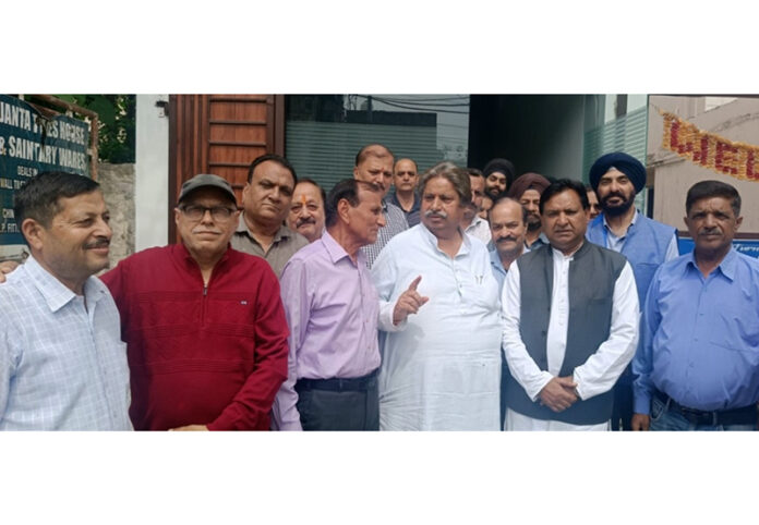 JKPCC working president, Raman Bhalla interacting with public in Gandhi Nagar area on Friday.