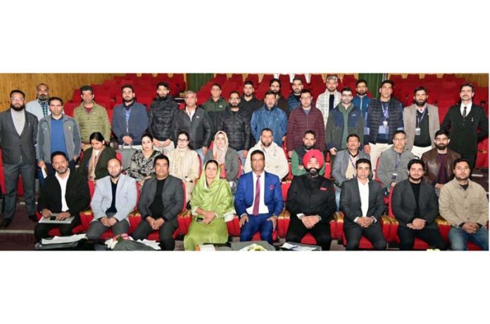 Labour Commissioner, Director J&K Judicial Academy and participants during the training programme at Srinagar on Thursday.