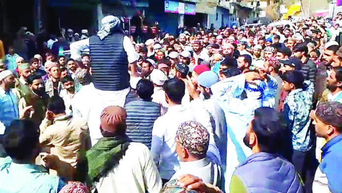 People protesting against US-Israel action at Budhal in Rajouri. -Excelsior/Imran