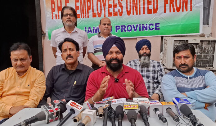 PHE daily wagers leaders during press conference in Jammu. -Excelsior/Rakesh