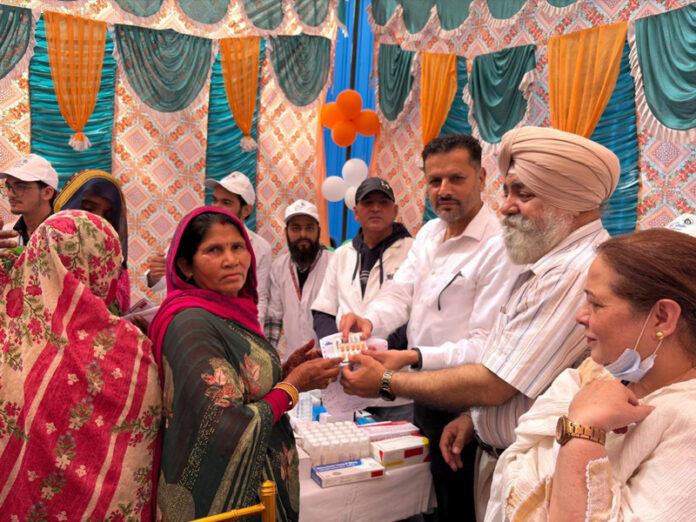 People being given medicines at Govt Hospital Sarwal.