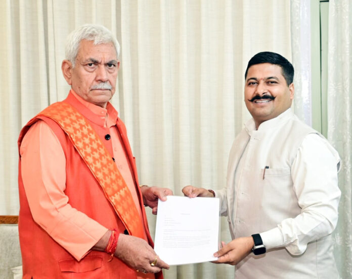 BJP spokesperson presenting vision document to LG on Tuesday.