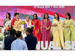 Varsha Bansal along with others posing for a photograph after taking over as sixth chairperson of FICCI FLO Jammu, Kashmir and Ladakh chapter.
