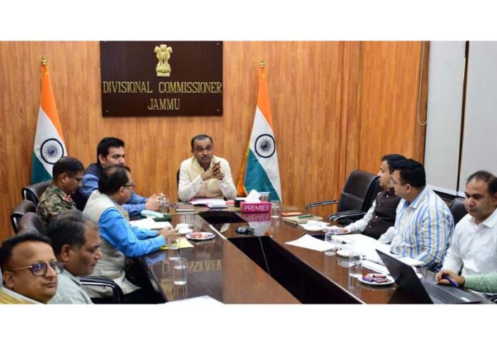 Div Com Ramesh Kumar chairing a meeting at Jammu on Thursday.