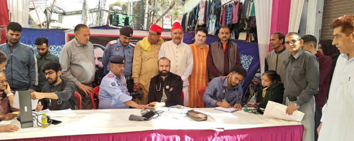 HoD Cardiology GMC & SSH Jammu Dr Sushil Sharma examining patients at Pacca Danga on Sunday. HoD Cardiology GMC & SSH Jammu Dr Sushil Sharma examining patients at Pacca Danga on Sunday.