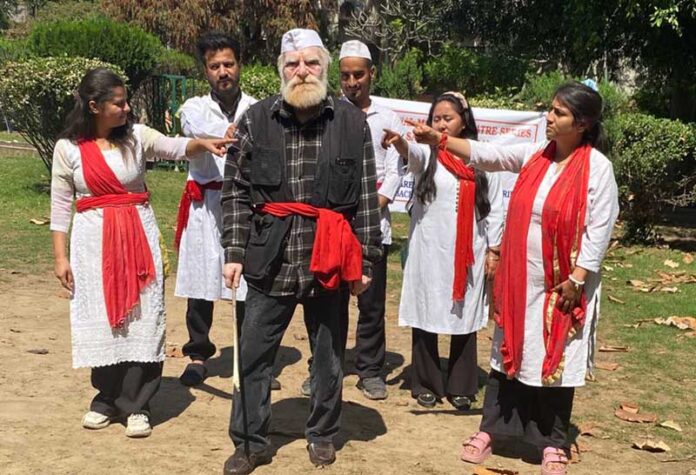 Artists performing in a nukad staged by ESRM in Jammu.