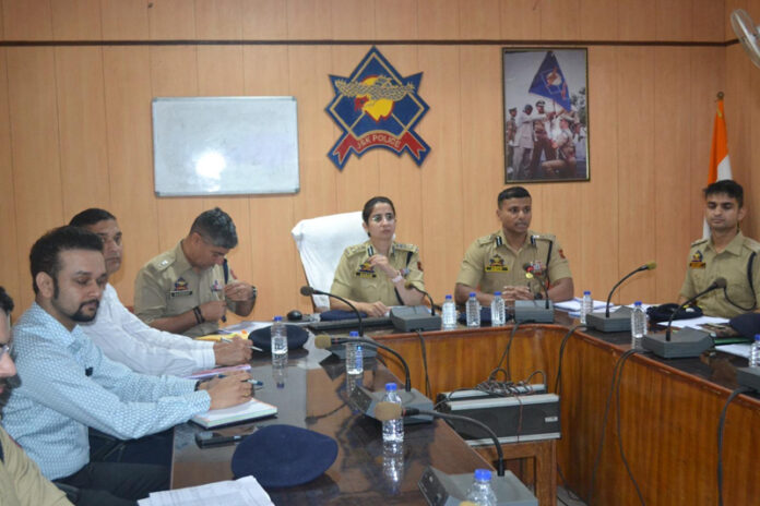 Sarah Rizvi, DIG charing a meeting in Udhampur.