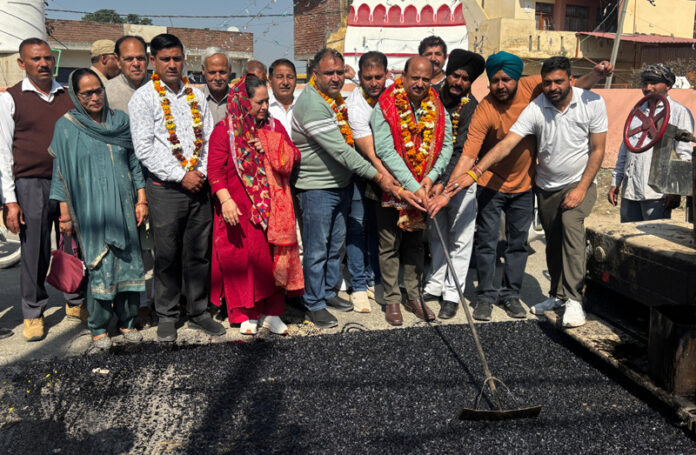 MLA Ramgarh, Dr. Devinder Kumar Manyal starting road blacktopping work in his constituency.
