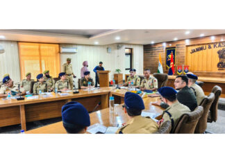 IGP Jammu BS Tuti chairing a meeting of police officers in Jammu district on Thursday.