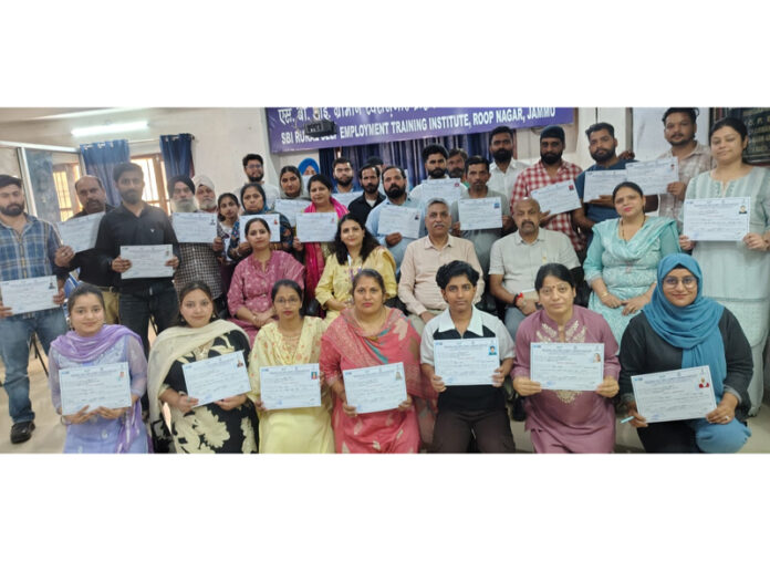 PMEGP beneficiaries displaying certificates they received on completion of training by SBI-RSETI Jammu. PMEGP beneficiaries displaying certificates they received on completion of training by SBI-RSETI Jammu.