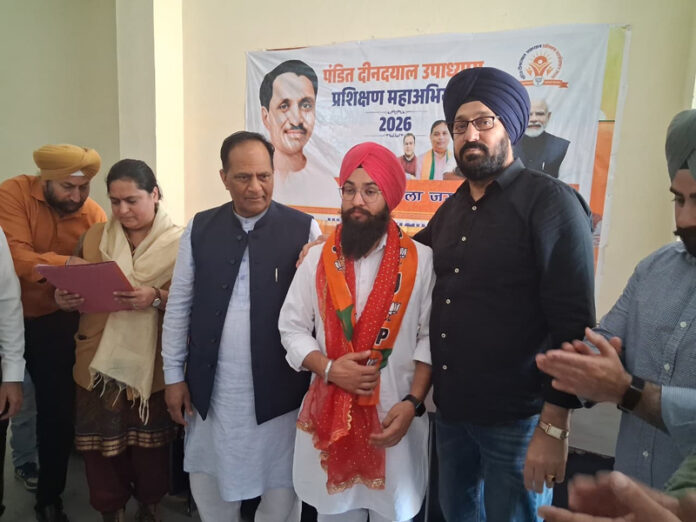 J&K BJP Minority Morcha president, Ranjodh Singh Nalwa and others after a party meeting in Jammu on Thursday.