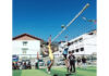 Volleyball players in action during a match in Doda.