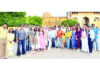 Students of Trikuta Degree College posing for a group photograph.