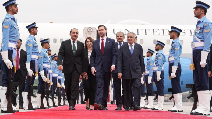 U.S. Vice President JD Vance, center, walks with Pakistan's Chief of Defence Forces and Chief of Army Staff Field Marshall Asim Munir, left, Pakistani Deputy Prime Minister and Foreign Minister Mohammad Ishaq Dar, right, Charge d'Affaires of the U.S. Embassy in Islamabad Natalie A. Baker, second left, and Pakistan's Interior Minister Mohsin Raza Naqvi, second right, after arriving for talks with Iranian officials in Islamabad, Pakistan