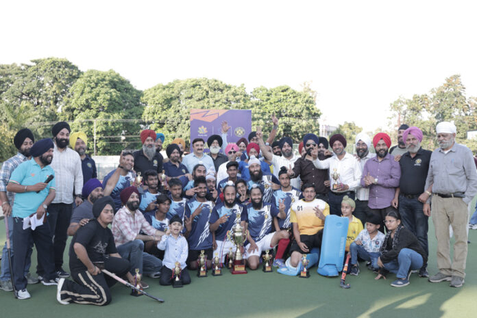 Winning team posing along with dignitaries. Winning team posing along with dignitaries.