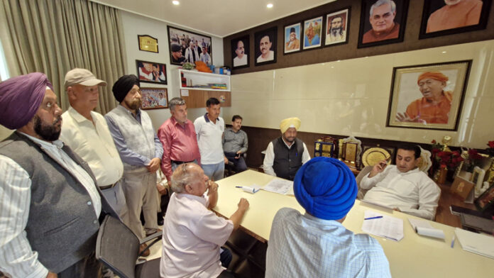 Rajiv Jasrotia addressing a meeting in his constituency on Wednesday.
