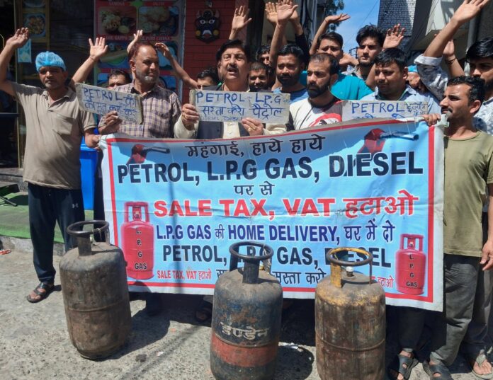 MSJK workers raise slogans during a protest in Jammu on Friday.
