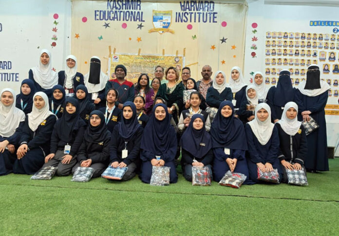 Students posing along with dignitaries during a programme.