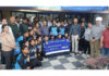 Hockey J&K awards Rs 1 lakh to Sub-Junior Women team Sub-Junior Women's Hockey team posing along with cheque alongside dignitaries.