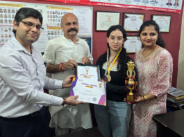 MLA, Jammu East Yudhvir Sethi honouring students during a programme.