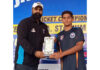 Tantray SC, Rehari Kings XI shine Dignitary presenting award to a player.