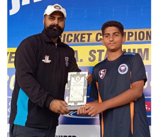 Dignitary presenting award to a player.