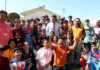 Players posing along with dignitaries during a programme.