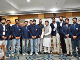 Union Minister Piyush Goyal with J&K Ranji team during a programme in New Delhi.
