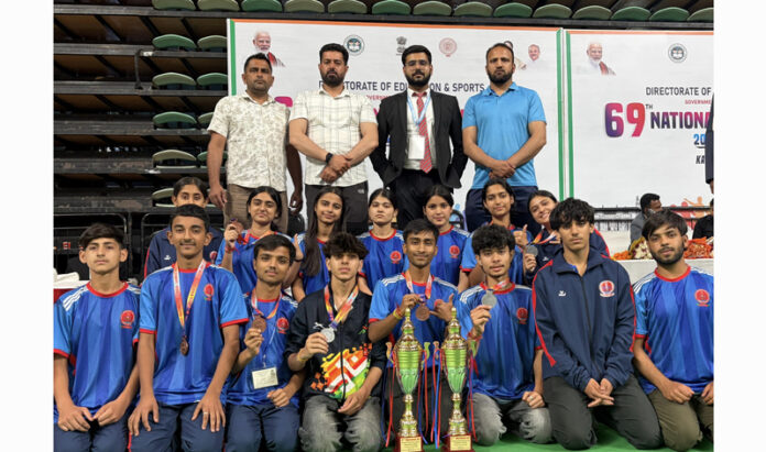 J&K Kalarippayattu team posing along with dignitaries.