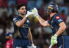 Shubam Gill celebrating with teammate after scoring half century in match against KKR.