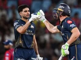 Shubam Gill celebrating with teammate after scoring half century in match against KKR.