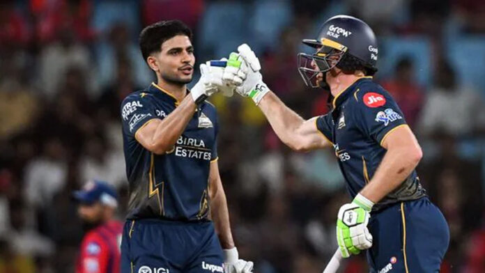 Shubam Gill celebrating with teammate after scoring half century in match against KKR.