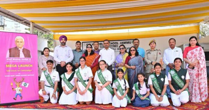 Students posing along with dignitaries during a programme.