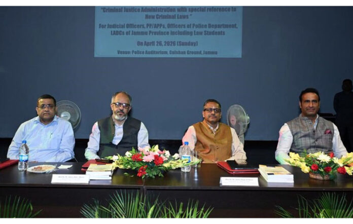 Dignitaries on the dais during an orientation programme on new criminal laws at Police Auditorium, Gulshan Ground, Jammu.